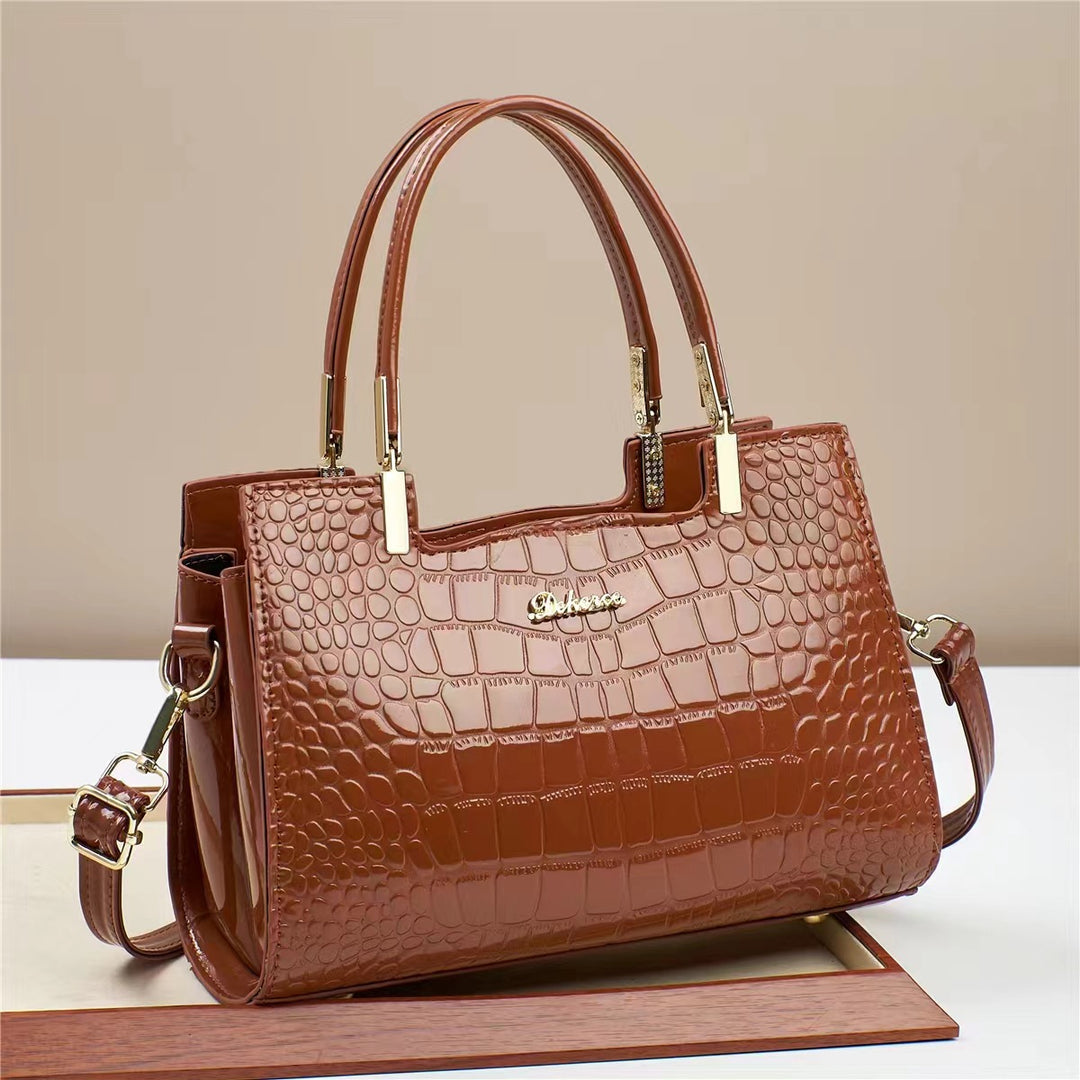 Damen Handtasche mit glänzender Krokodilprägung und abnehmbarem Tragegurt Nord Taschen