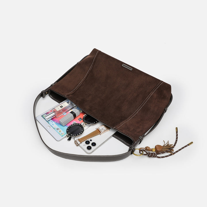 Damen Hobo Tasche mit elegantem Leder und dekorativen Quasten Nord Taschen
