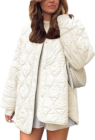 Damen Steppjacke im Oversize Design mit gewölbter Steppung und seitlichem Schlitz Nord Taschen