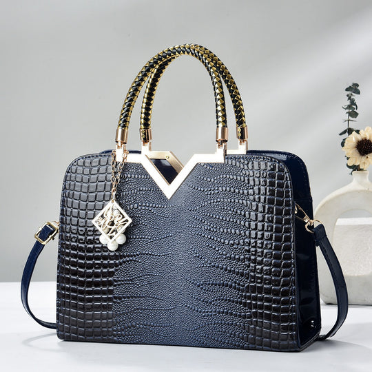 Damen elegante Handtasche mit luxuriöser Croco-Prägung und goldenen Akzenten Nord Taschen