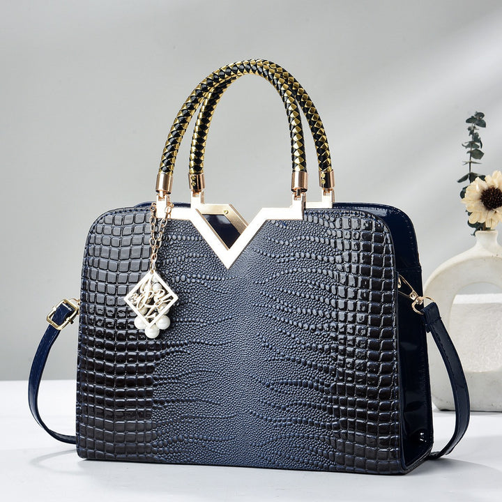 Damen elegante Handtasche mit luxuriöser Croco-Prägung und goldenen Akzenten Nord Taschen