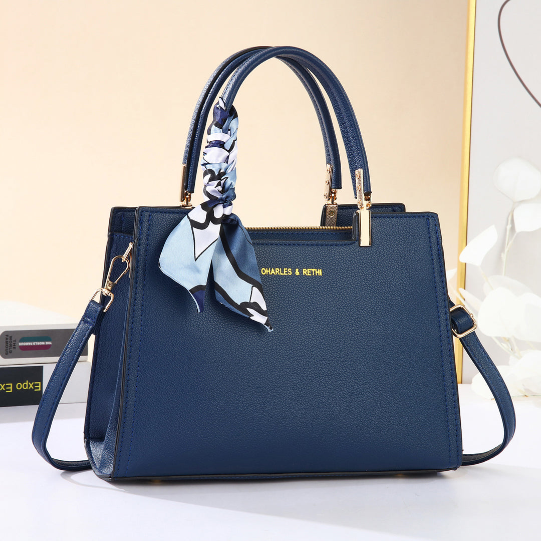Damen elegante Designer-Handtasche mit farbenfrohem Schal Nord Taschen