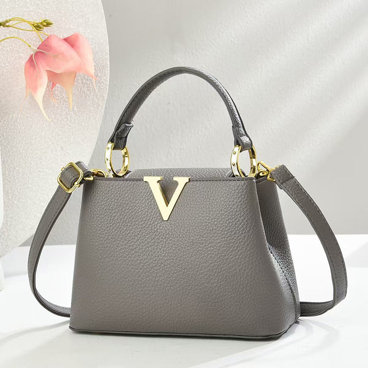 Damen stilvolle Handtasche mit goldenen Akzenten und verstellbarem Schulterriemen Nord Taschen