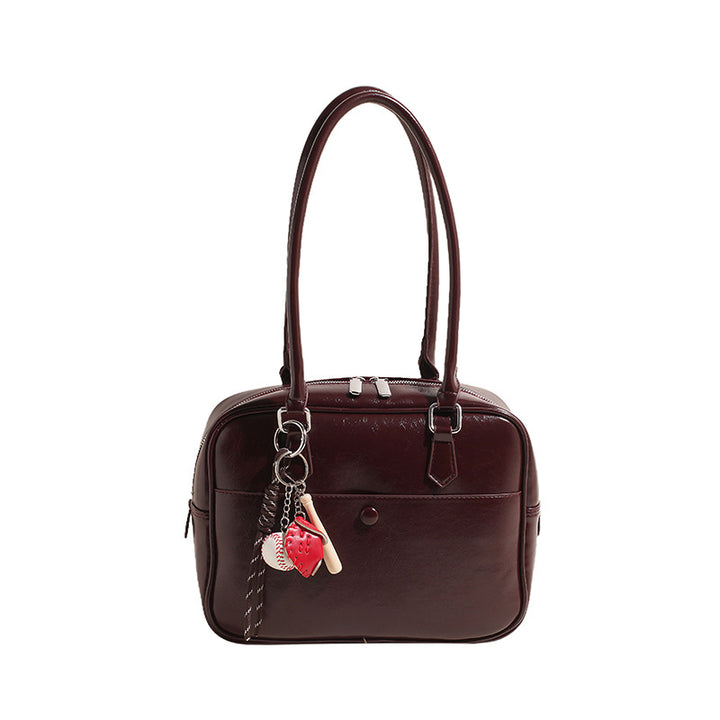 Damen praktische Lederhandtasche mit charmantem Anhänger Nord Taschen