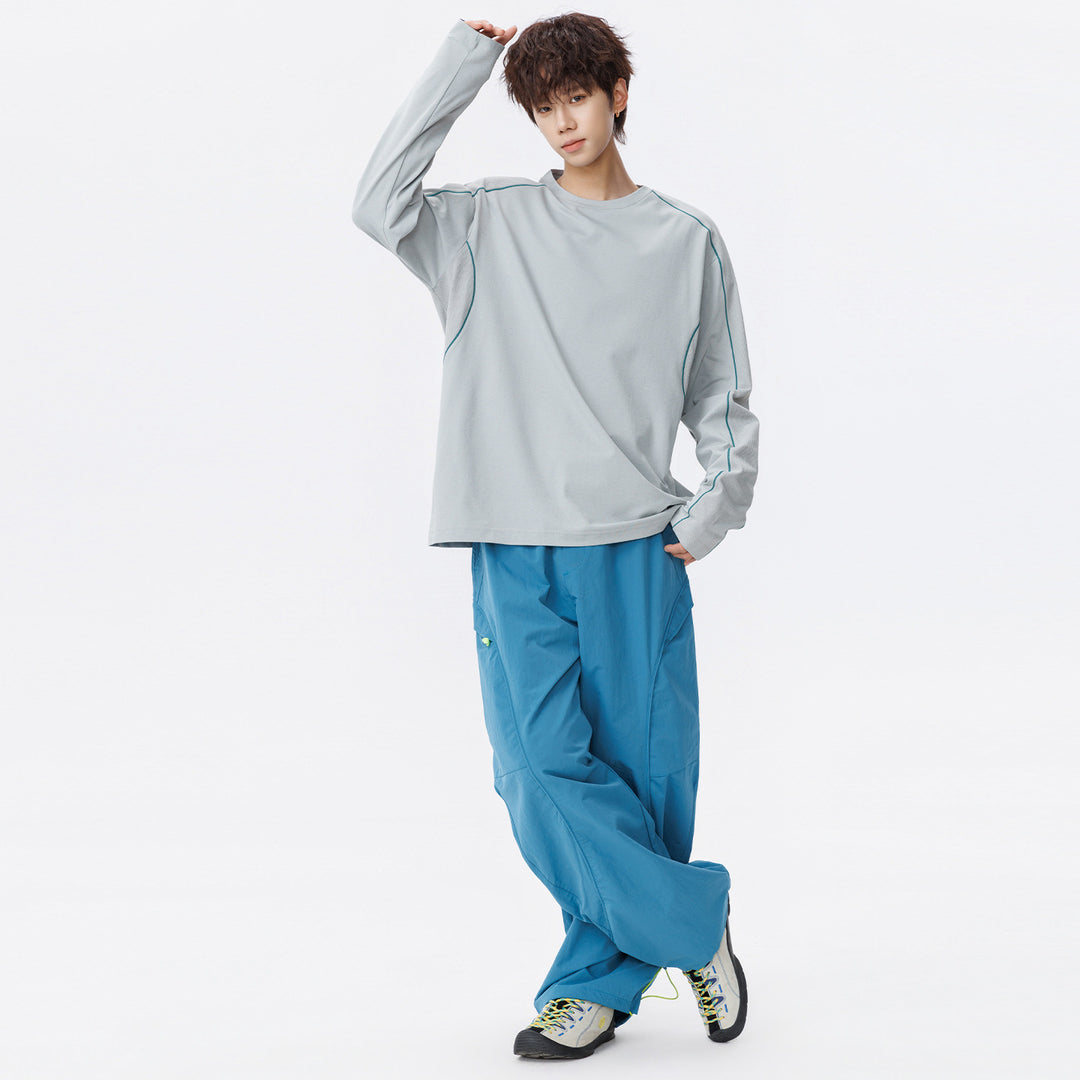 Damen Oversize-Langarmshirt aus Waffel‑ und Jersey‑Mix mit kontrastierenden Flatlocknähten Nord Taschen