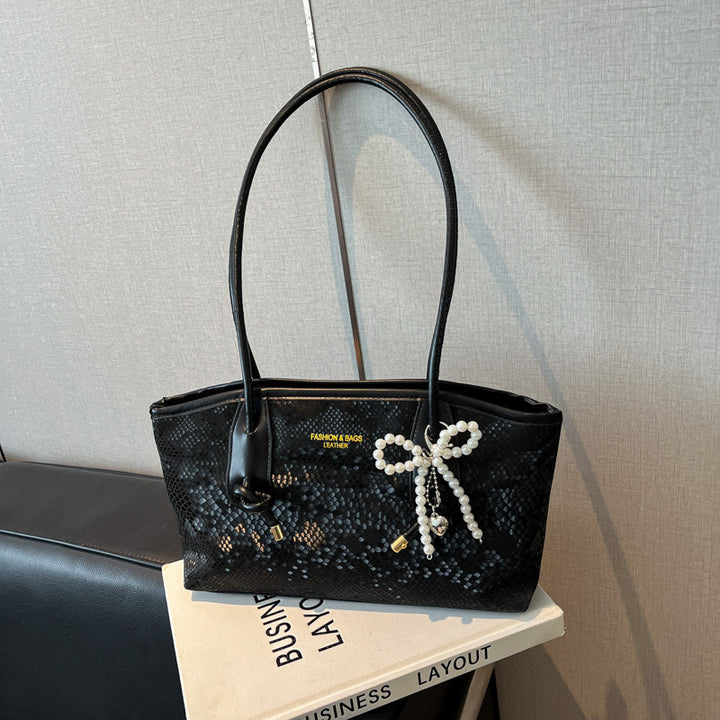 Damen elegante Handtasche mit magnetischem Verschluss und stilvollen Kordelzügen Nord Taschen