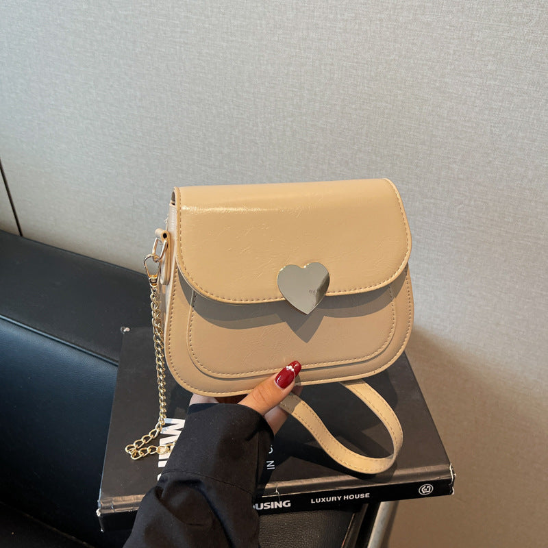 Damen elegante Umhängetasche mit Herzverschluss Nord Taschen