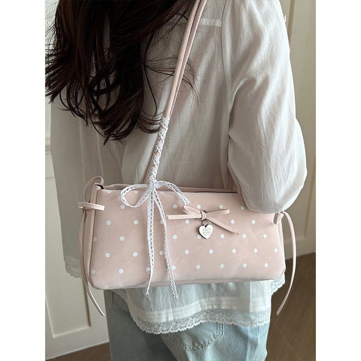 Damen Handtasche mit spielerischem Punktemuster und eleganten Details Nord Taschen