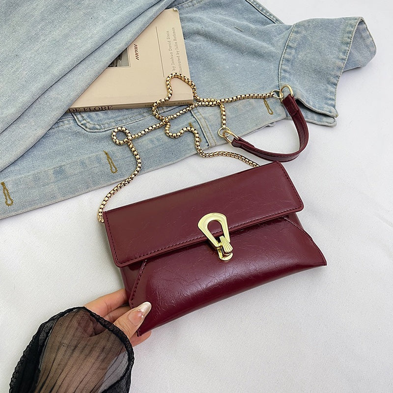 Damen elegante Handtasche im zeitlosen Design mit metallischen Akzenten Nord Taschen