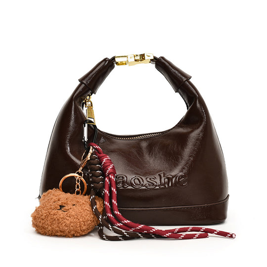 Damen elegante Hobo-Tasche mit plüschigem Anhänger Nord Taschen