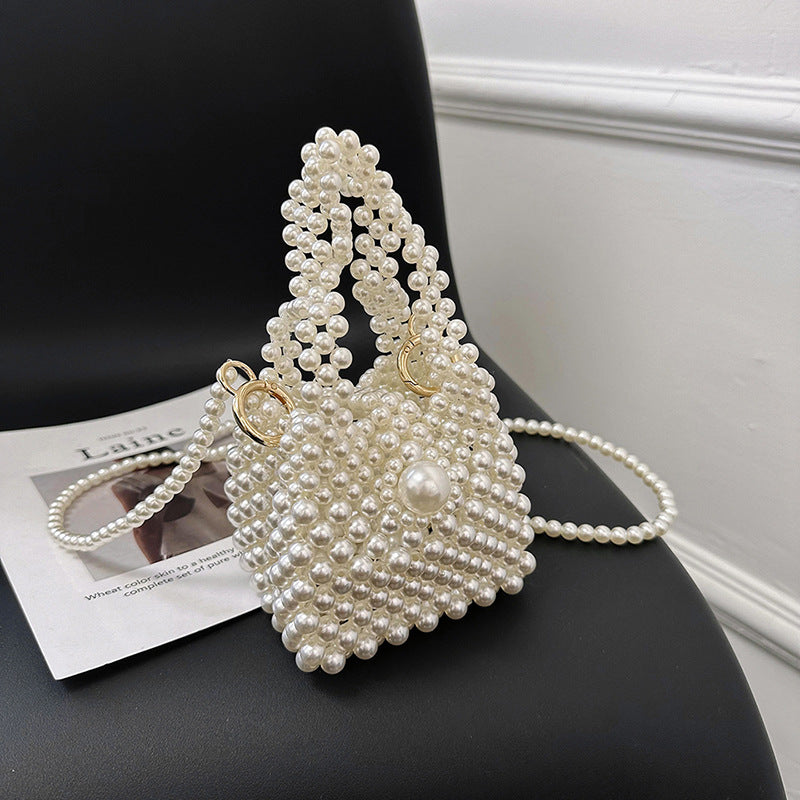 Damen Clutch-Tasche mit perlensynthetischer Oberfläche und dekorativem Verschluss Nord Taschen
