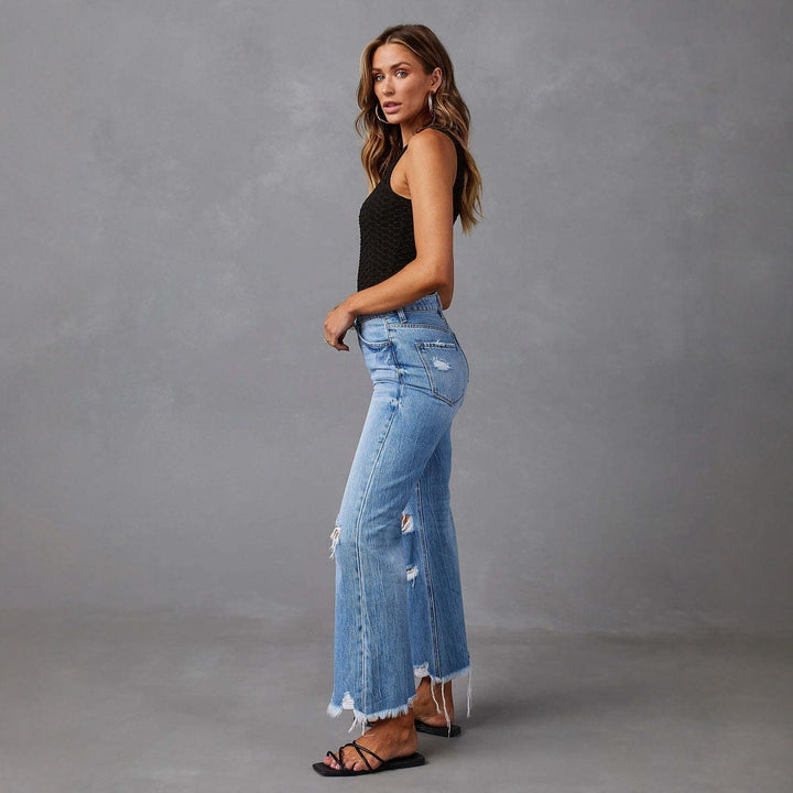 Damen hochgeschnittene ausgestellte Destroyed-Jeans mit Knieausfransungen und rohem Saum Nord Taschen