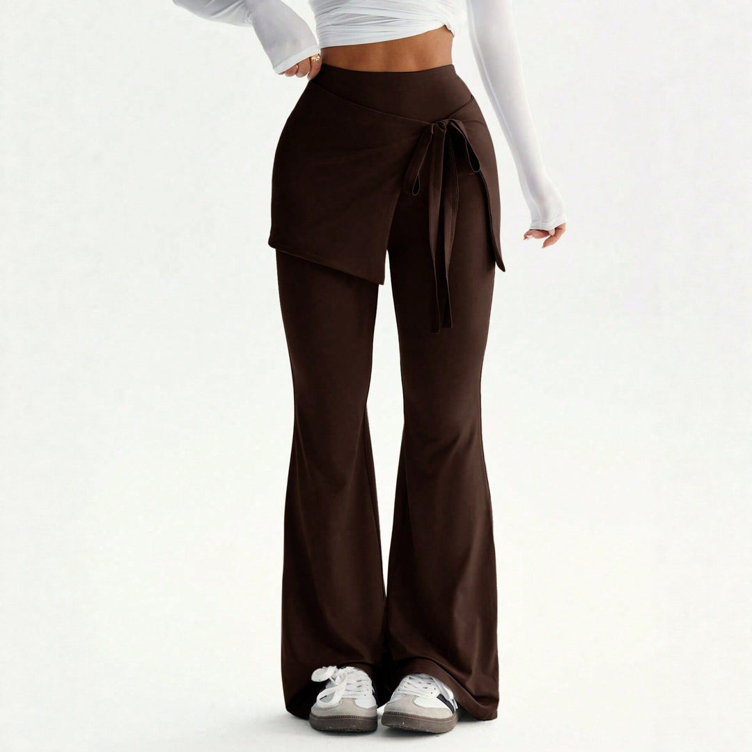 Damen hochtaillierte Schlaghose mit Wickelrock-Overlay und Taillenschleife Nord Taschen