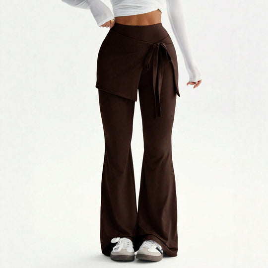 Damen hochtaillierte Schlaghose mit Wickelrock-Overlay und Taillenschleife Nord Taschen