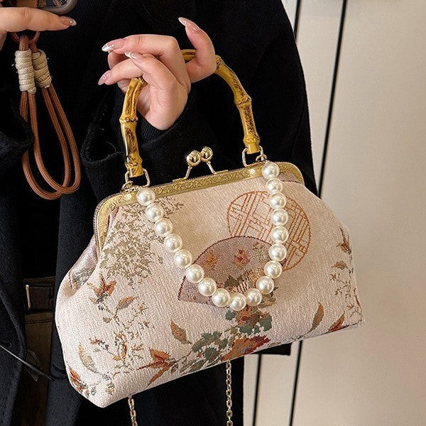 Damen elegante Umhängetasche mit kunstvollem Perlenverschluss Nord Taschen