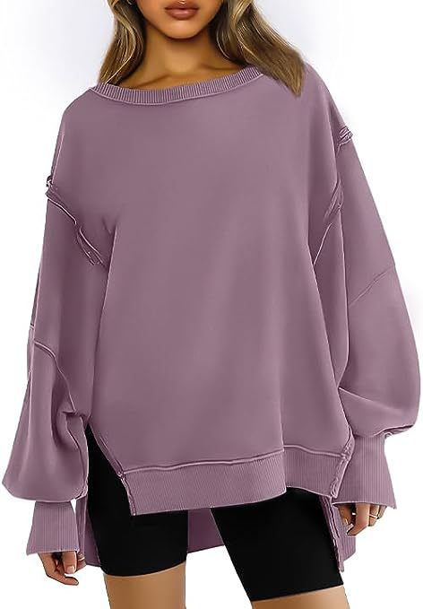 Damen Oversized Sweatshirt mit Ballonärmeln, seitlichen Schlitzen und offenen Kanten Nord Taschen