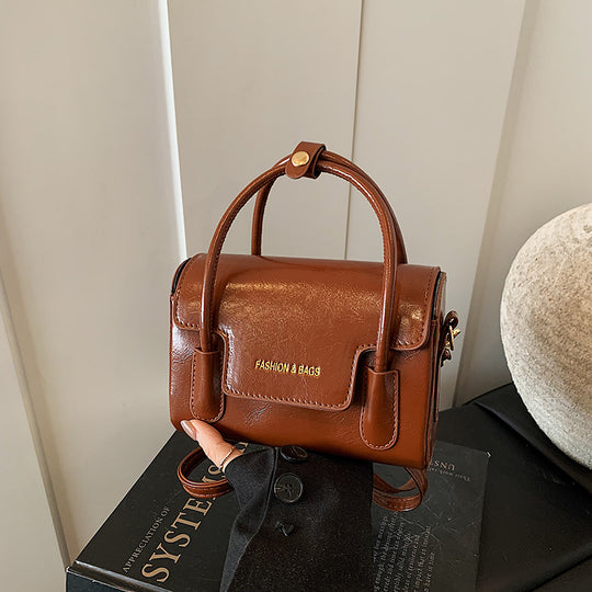 Damen Umhängetasche mit eleganter Struktur und praktischem abnehmbarem Griff Nord Taschen