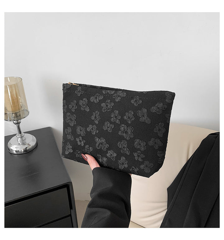 Damen Clutch-Tasche mit floralem Design und hochwertiger Textur Nord Taschen