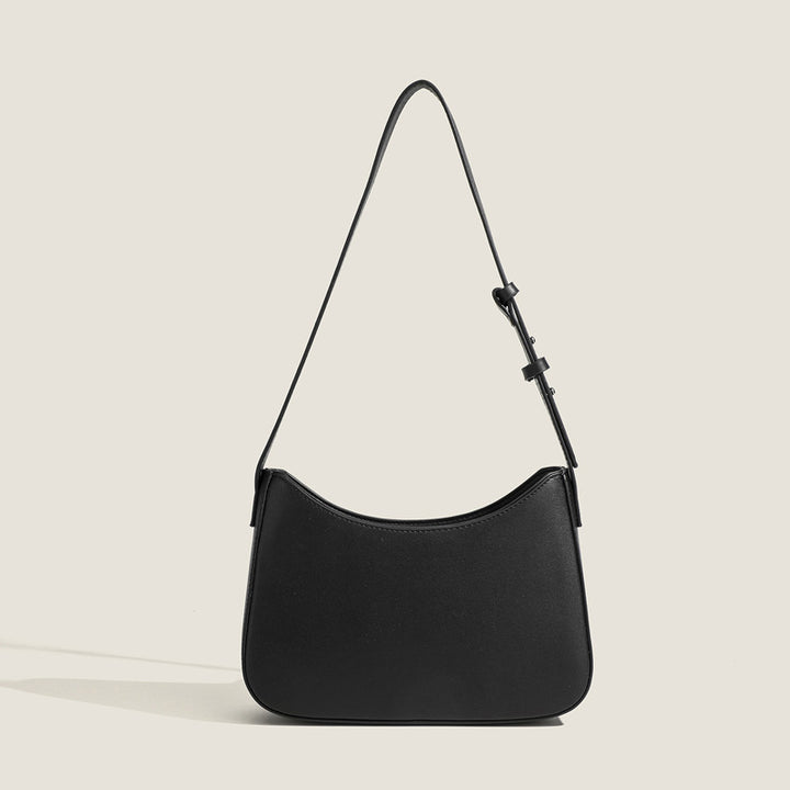 Damen Schultertasche mit geschwungener Silhouette und stylischem Gurt Nord Taschen