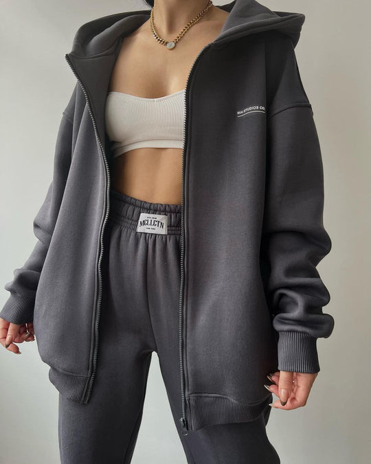 Damen Oversize Kapuzen-Sweatjacke mit Reißverschluss und High-Waist Jogginghose Set Nord Taschen