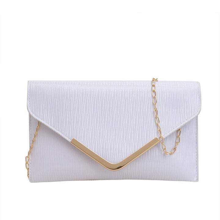 Damen elegante Clutch mit strukturiertem Obermaterial und goldenen Akzenten Nord Taschen
