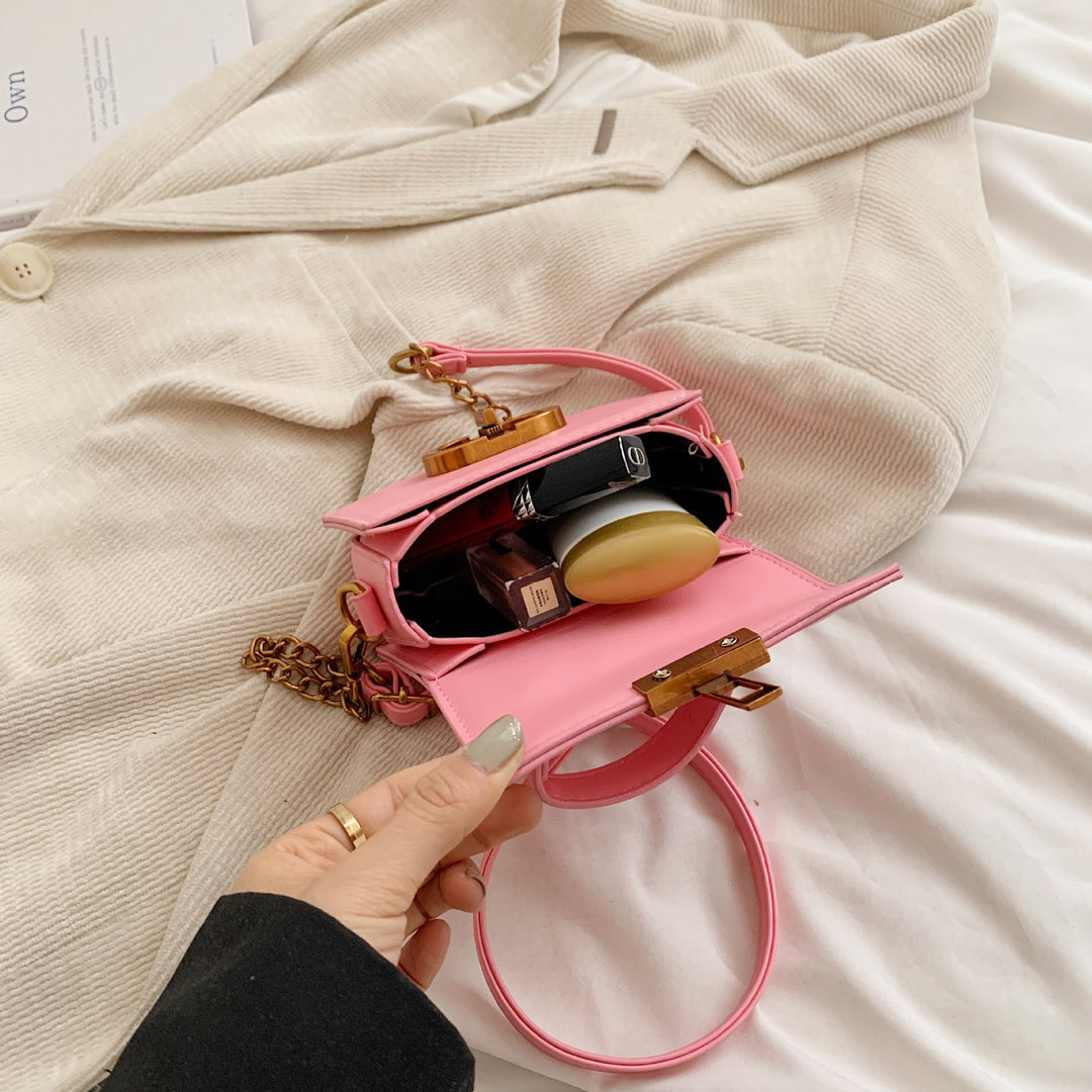 Damen elegante Handtasche mit stilvollem Metallverschluss Nord Taschen