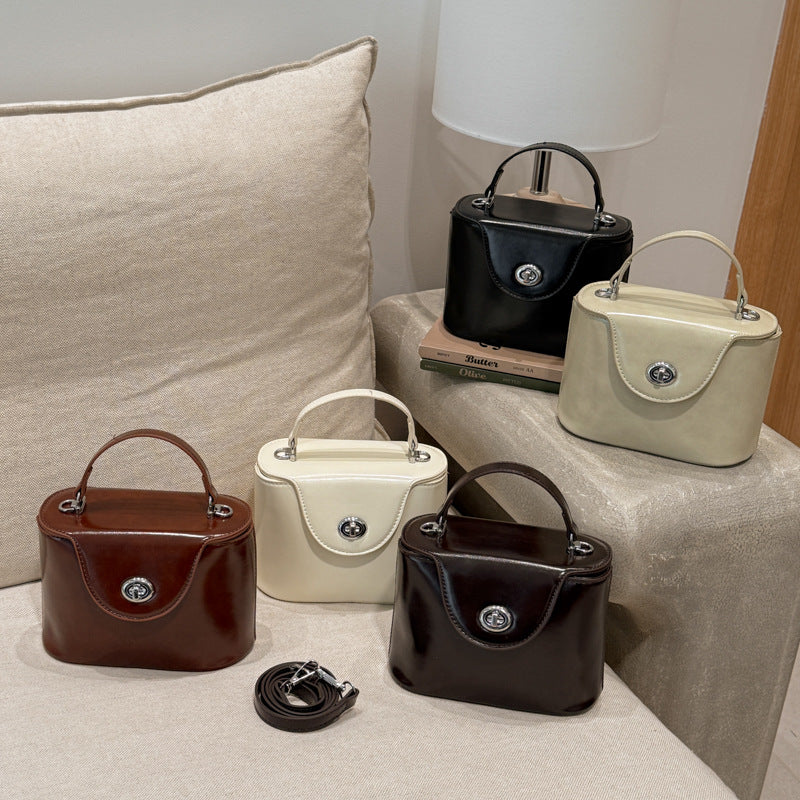 Damen elegante Mini-Handtasche mit modischem Anhänger Nord Taschen