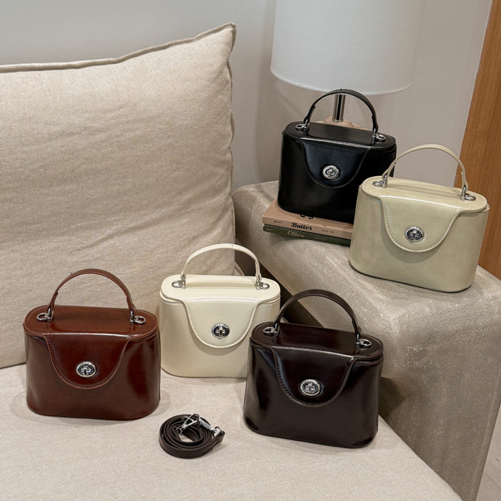 Damen elegante Mini-Handtasche mit modischem Anhänger Nord Taschen