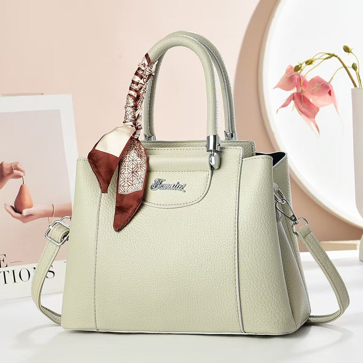 Damen Handtasche mit strukturiertem Kunstleder und stilvollem Schal Nord Taschen