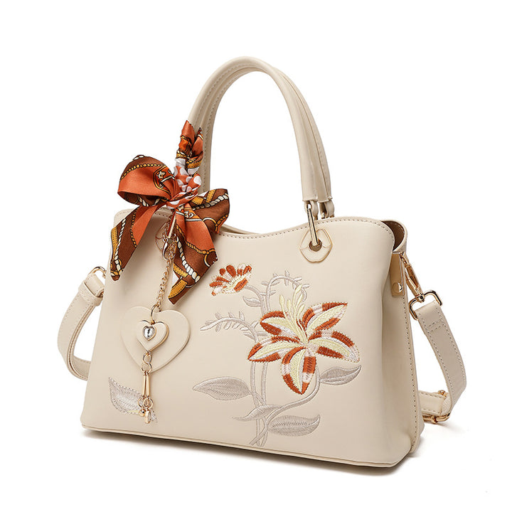 Damen elegante Handtasche mit floralem Stickdesign und modischem Schal Nord Taschen