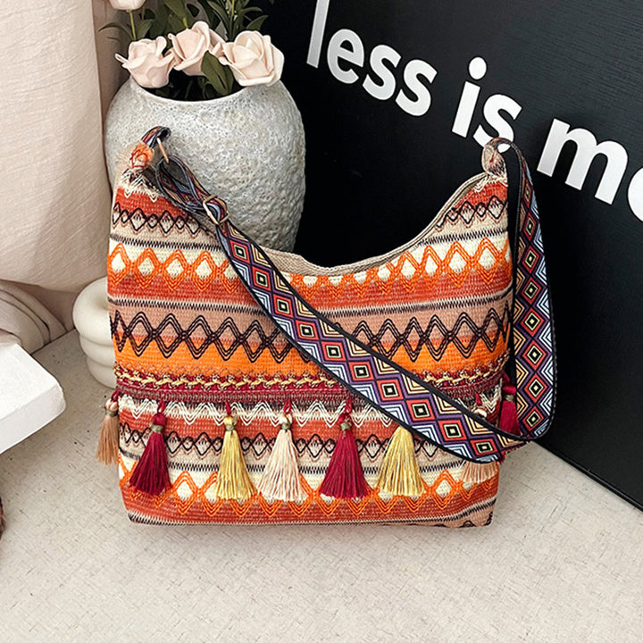 Damen Umhängetasche mit kunstvollem Ethnodesign und lebhaften Quasten Nord Taschen