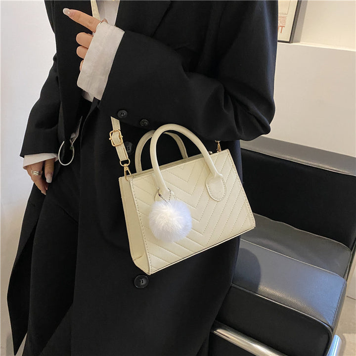 Damen elegante Handtasche im strukturierten Chevron-Design Nord Taschen