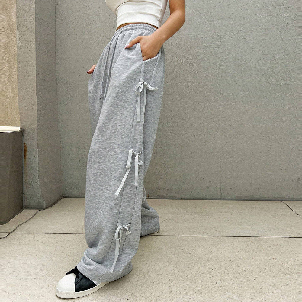 Damen lockere Wide‑Leg Loungehose mit elastischem Bund, Kordelzug und seitlichen Zierschleifen Nord Taschen