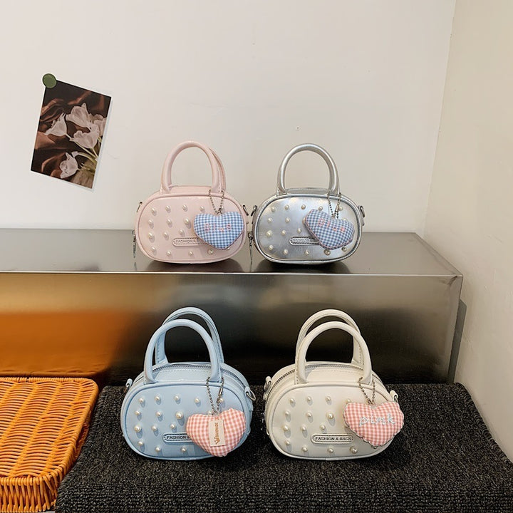 Damen trendige Mini-Handtasche mit auffälligen Perlenapplikationen Nord Taschen