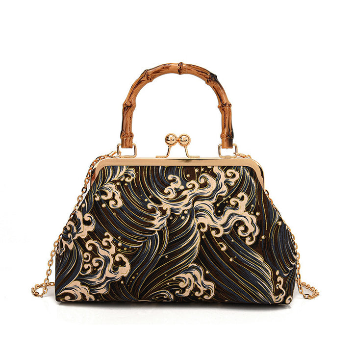 Damen Designer Handtasche mit kunstvollem Wellenmotiv Nord Taschen