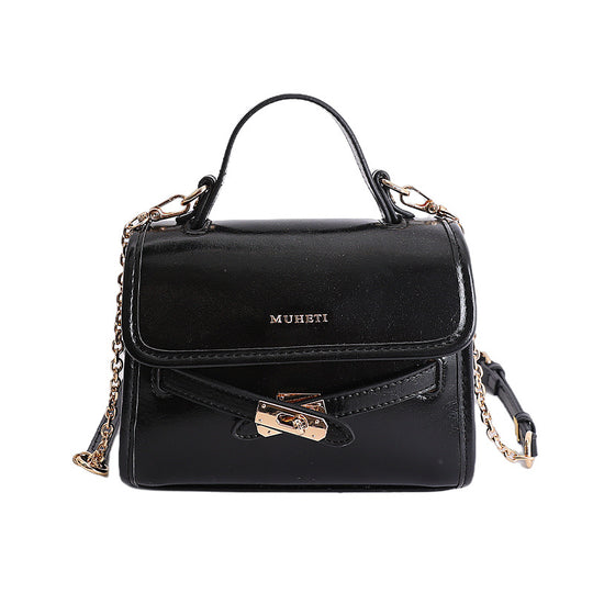Damen Minihandtasche mit verspieltem Schlüsselanhänger Nord Taschen
