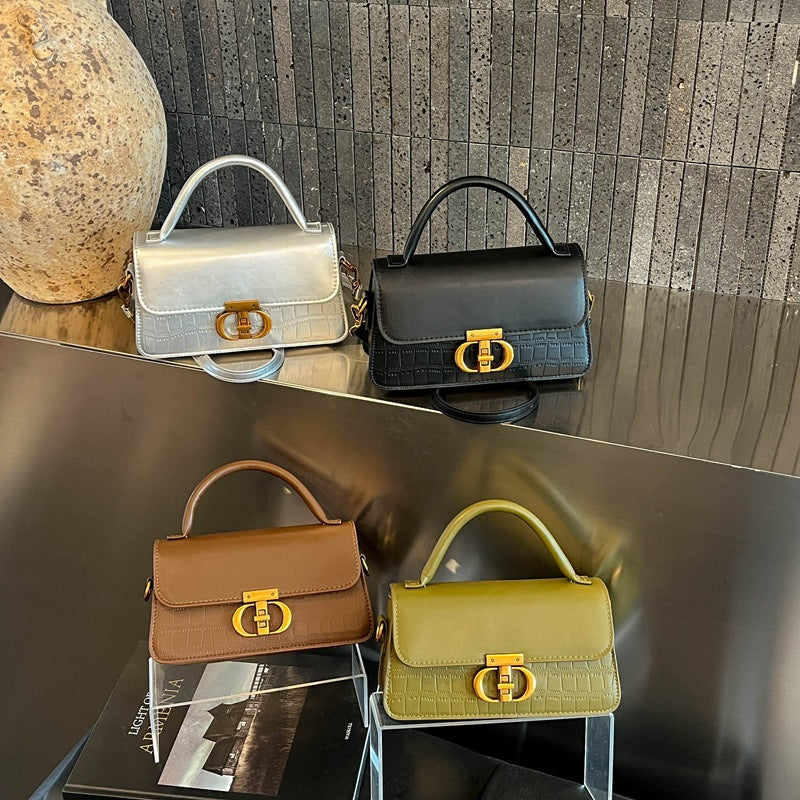 Damen elegante Handtasche mit strukturierter Oberfläche und glänzendem Verschluss Nord Taschen