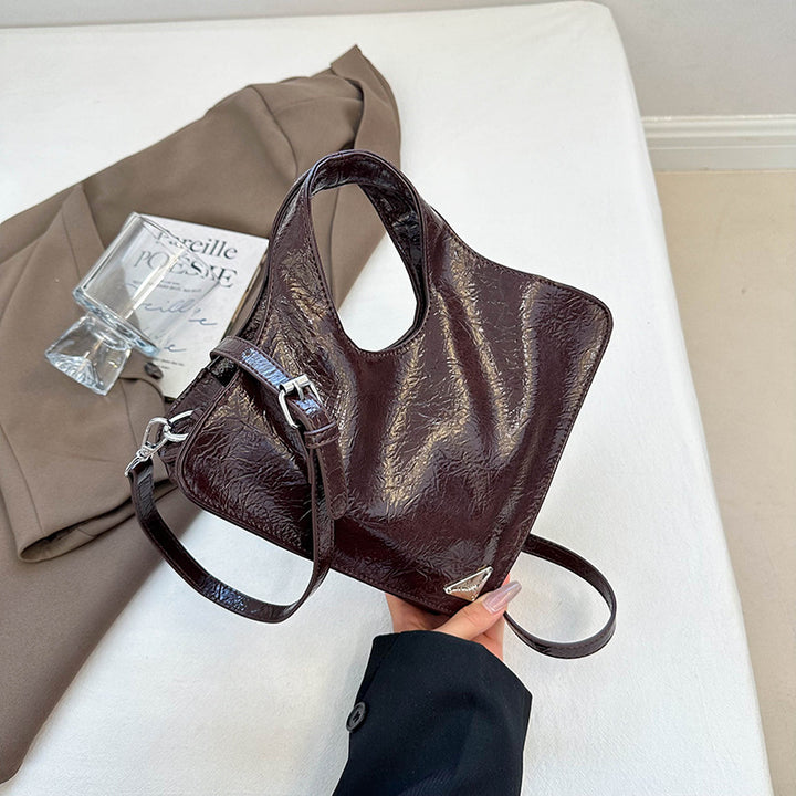 Damen stilvolle Handtasche aus glänzendem Kunstleder Nord Taschen