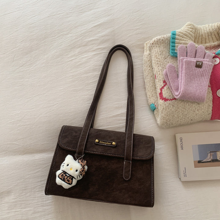 Damen modische Handtasche im charmanten Lederlook mit abnehmbarem Anhänger Nord Taschen