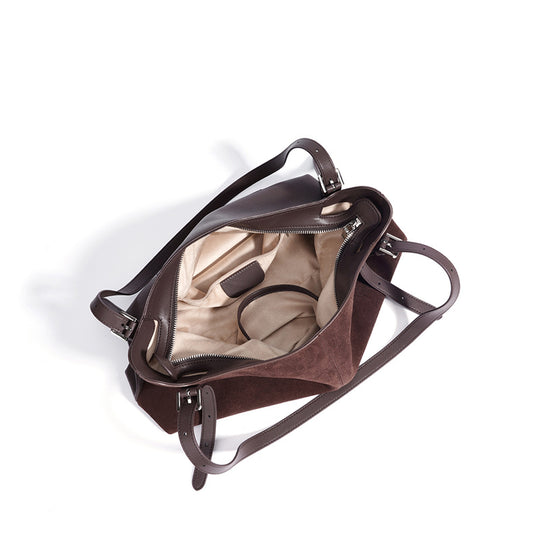 Damen Umhängetasche aus weichem Wildleder mit eleganten Akzenten Nord Taschen