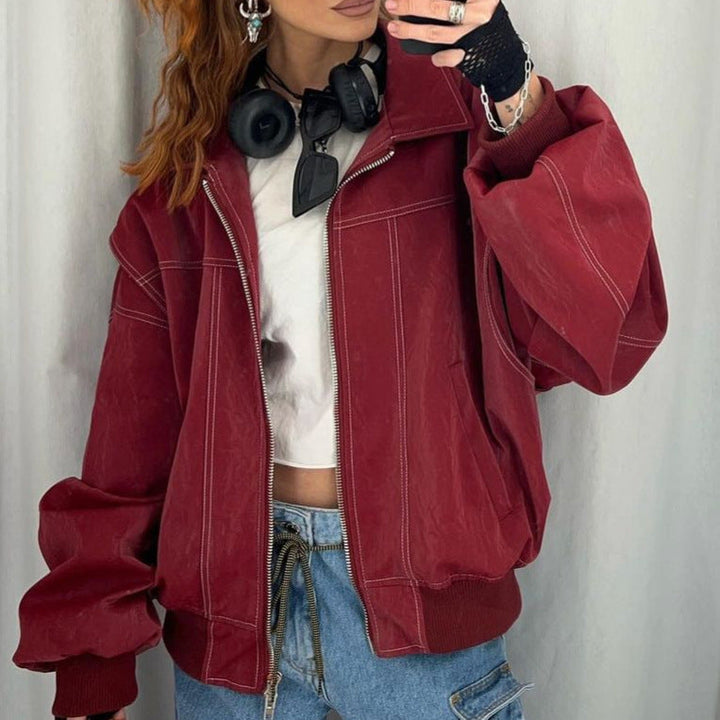 Damen Kunstlederjacke mit elastischen Bündchen und hochschließendem Kragen