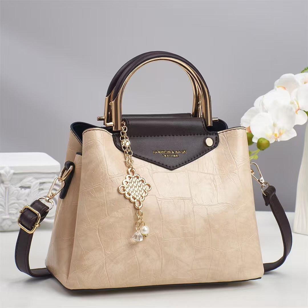 Damen elegante Handtasche mit goldenen Akzenten Nord Taschen