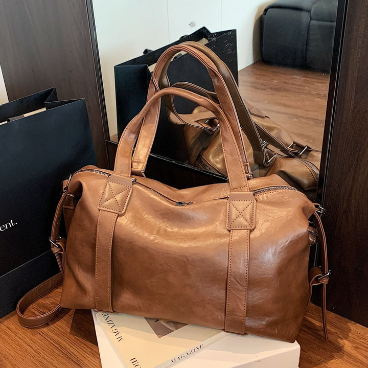 Damen Ledertasche mit geräumigem Innenraum und praktischem Tragegriff Nord Taschen