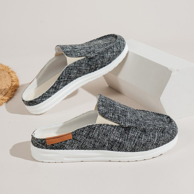 Damen  Slip-On Canvas‑Mules mit Kuhfleckenprint, gepolstertem Komfortfußbett und rutschfester Leichtsohle Nord Taschen