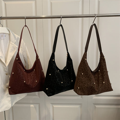 Damen Hobo-Tasche mit elegantem Leopardenmuster und goldenen Akzenten Nord Taschen