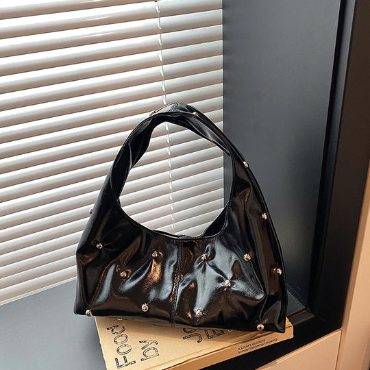 Damen glänzende Handtasche mit strukturiertem Design Nord Taschen