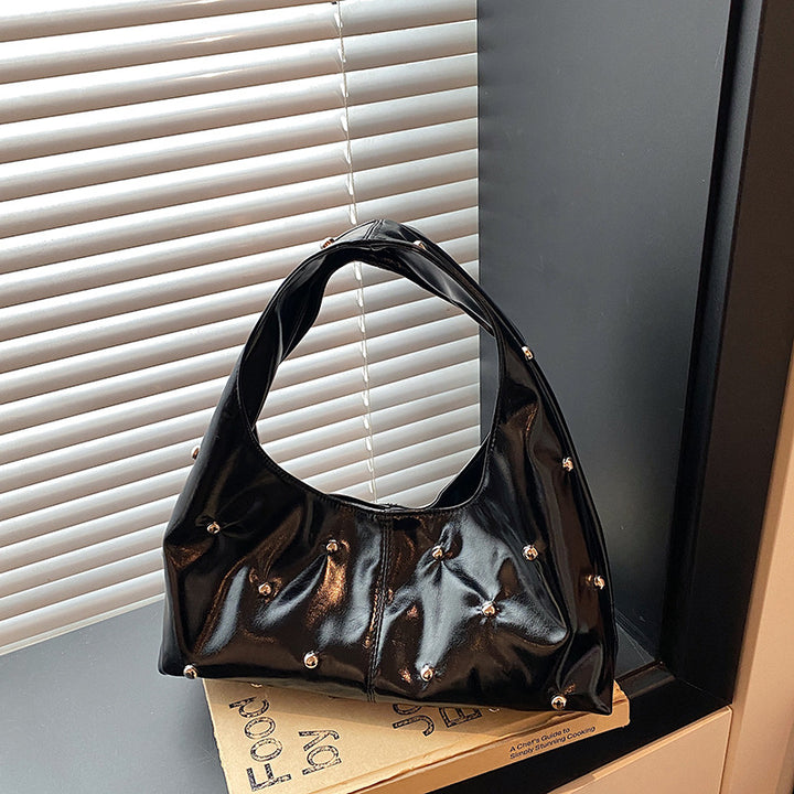 Damen glänzende Handtasche mit strukturiertem Design Nord Taschen