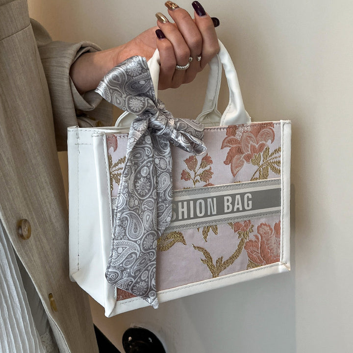 Damen Mini-Henkeltasche mit einzigartigem floralem Design und elegantem Schleifenakzent Nord Taschen