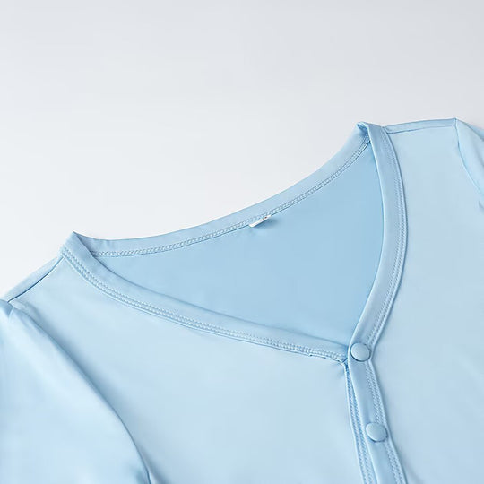 Damen Wickelbluse mit asymmetrischer Knopfleiste, Volant-Saum und Trompetenärmeln Nord Taschen