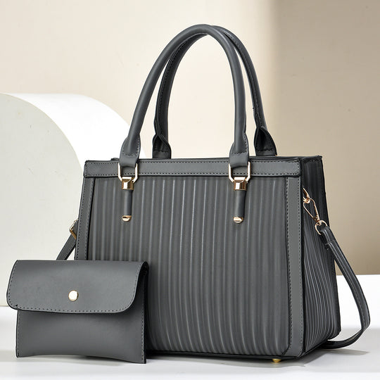 Damen elegante Handtasche mit Streifenstruktur und abnehmbarer Clutch Nord Taschen